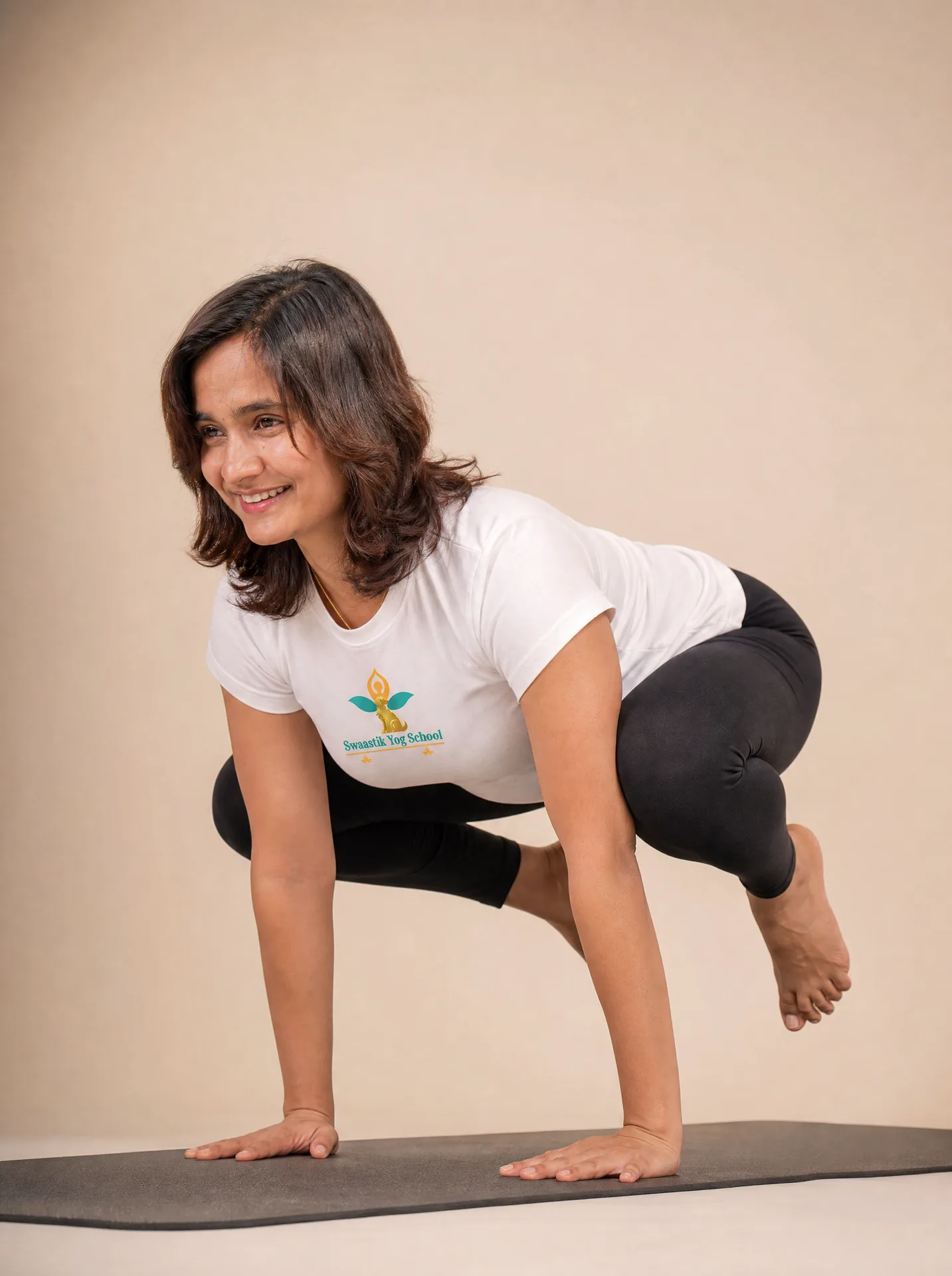 Bakasana crow pose arm balance practiced during advanced 300 hour yoga teacher training